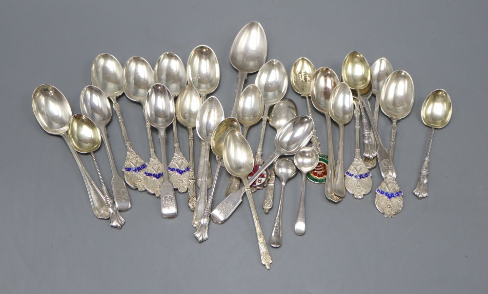 Twenty nine assorted silver tea and coffee spoons including some with enamelled presentation decoration, gross 13oz.